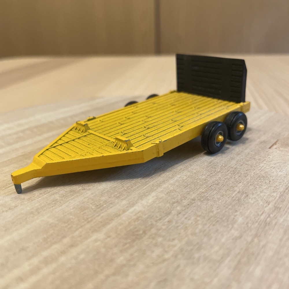 ERTL 1/64 Yellow Machine Flatbed Trailer Dual Axle Diecast Farm Toy
